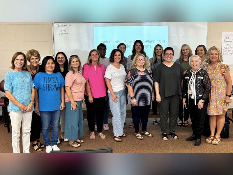 Photograph of Coaches Vickie Brown and Lisa Dear presented training to teaching pairs, or dyads, at Jacksonville State University on July 12, 2023.